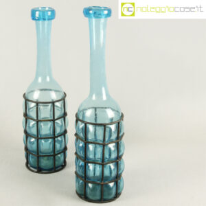 Bottiglie in vetro soffiato in gabbia