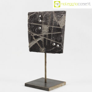 Piastra in cemento grigio graffiato